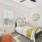 a bedroom with a bed and a chair