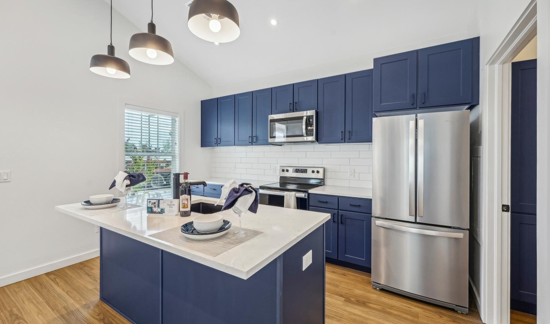 Beautiful kitchens with designer finishes a kitchen with blue cabinets