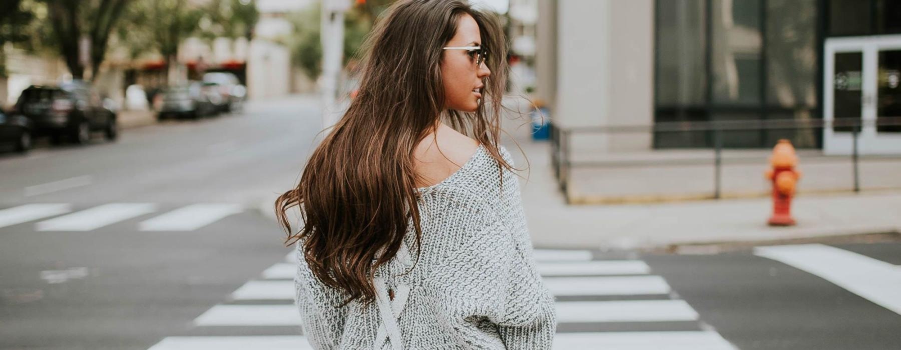 a person walking in a crosswalk