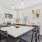 a kitchen with a dining island