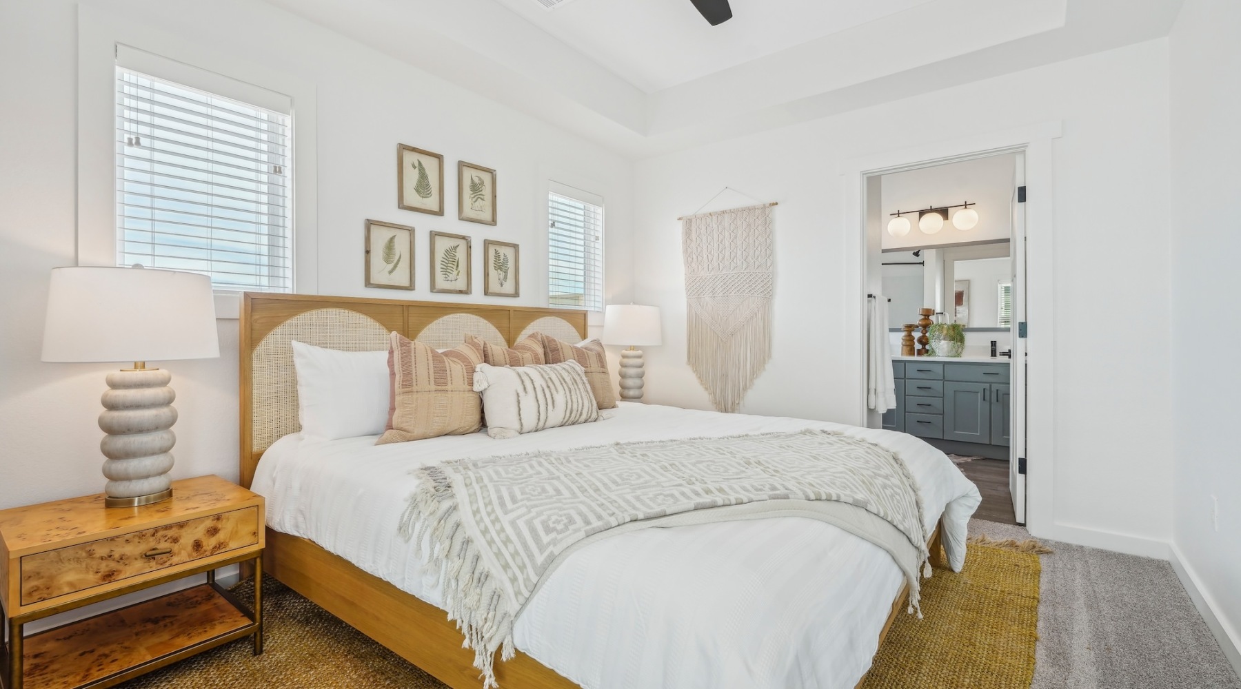 Sleep in style Bedroom with lamps on nightstands and a window