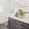 a bathroom with a large mirror