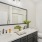 a bathroom with a large mirror
